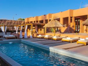 Bazén v ubytování NOI Casa Atacama nebo v jeho okolí + 27 fotografií