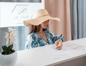 Hosté ubytování La Perla Luxury Rooms + 37 fotografií