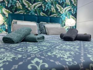 Postel nebo postele na pokoji v ubytování Apartman Milos, privatan parking