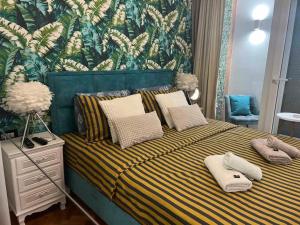 Postel nebo postele na pokoji v ubytování Apartman Milos, privatan parking