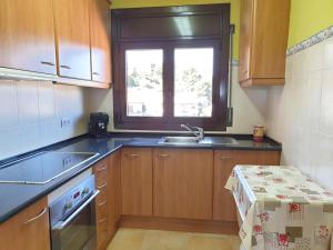 A kitchen or kitchenette at 5594 Apartment in Llançà