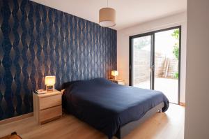 Postel nebo postele na pokoji v ubytování Maison St Brice Terrasse lits en 160 Confortable