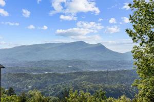 a view of a valley with mountains in the distance at Mountain Paradise by Eden Crest in Sevierville