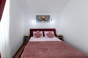 Postel nebo postele na pokoji v ubytování Casa Lya