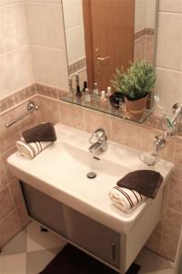 a bathroom with a sink and a mirror at Villa Luka in Pag +155 photos