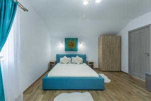 Postel nebo postele na pokoji v ubytování Casa Lya