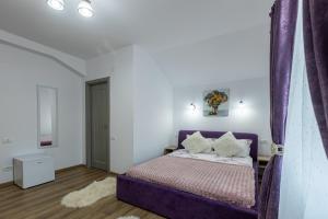 Postel nebo postele na pokoji v ubytování Casa Lya