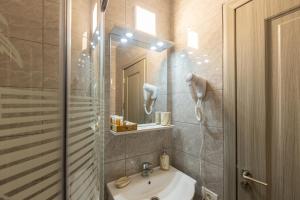 Koupelna v ubytování Casa Lya + 37 fotografií
