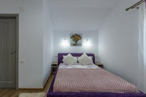 Postel nebo postele na pokoji v ubytování Casa Lya