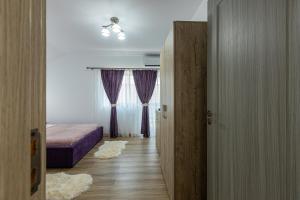 Postel nebo postele na pokoji v ubytování Casa Lya