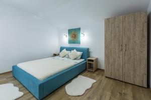 Postel nebo postele na pokoji v ubytování Casa Lya