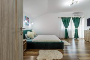 Postel nebo postele na pokoji v ubytování Casa Lya