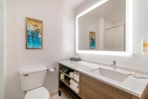 a bathroom with a sink and a mirror at Comfort Inn & Suites Saratoga Springs in Saratoga Springs +50 photos