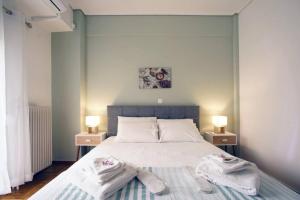 Postel nebo postele na pokoji v ubytování Νew Thission Luxury Apartment