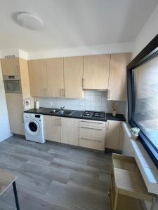 Een keuken of kitchenette bij appartement Axelle 2