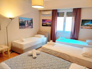 Comfortable apartment in Syntagma square客房内的一张或多张床位