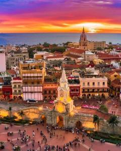 a view of a city with a clock tower at Catedral in Cartagena de Indias