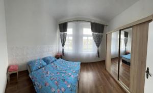 Postel nebo postele na pokoji v ubytování Penzion Sokolov 6
