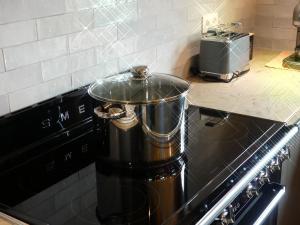 Cuisine ou kitchenette dans l'établissement Coeur de Loup