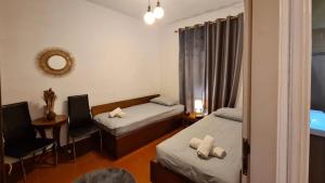 Posteľ alebo postele v izbe v ubytovaní Harmony Platanidia Pelion