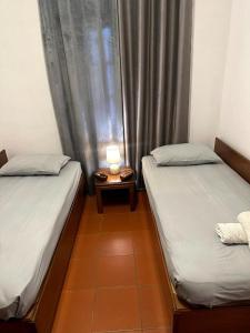 Posteľ alebo postele v izbe v ubytovaní Harmony Platanidia Pelion