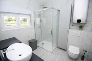 Koupelna v ubytování Apartman KATARINA + 32 fotografií