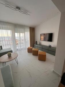 TV a/nebo společenská místnost v ubytování Apartman KATARINA