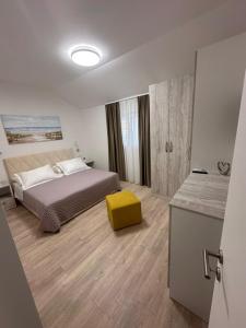 Postel nebo postele na pokoji v ubytování Apartman KATARINA