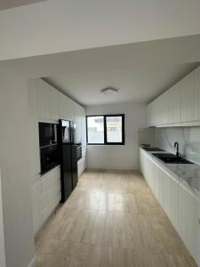 Kuchyň nebo kuchyňský kout v ubytování Vila Meditteran