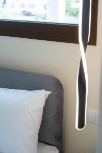 Ένα ή περισσότερα κρεβάτια σε δωμάτιο στο Blue Mare Aurora Apartments +6 φωτογραφίες