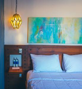 Postel nebo postele na pokoji v ubytování Hotel Boutique Casa Altamira