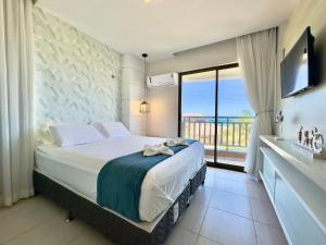 Ένα ή περισσότερα κρεβάτια σε δωμάτιο στο Resort Beach Place, Porto das Dunas - CE +140 φωτογραφίες