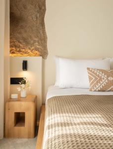Postel nebo postele na pokoji v ubytování Philosophy of Mykonos Boutique Hotel