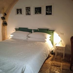 Ένα ή περισσότερα κρεβάτια σε δωμάτιο στο IL Borgo Antico b&b +45 φωτογραφίες