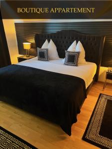 Postel nebo postele na pokoji v ubytování Boutique Appartement