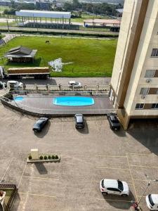 Kolam renang di atau dekat dengan Apartamento em Torres