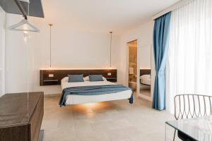 Ένα ή περισσότερα κρεβάτια σε δωμάτιο στο Cela Una Volta
