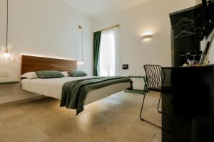 Letto o letti in una camera di Cela Una Volta