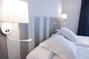 Cama o camas de una habitación en Hotel La Palma de Llanes