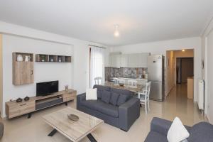 Posezení v ubytování Kallikratia Suites 3