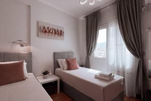 Letto o letti in una camera di Penthouse - Amazing View in the Center of Athens