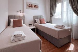 Letto o letti in una camera di Penthouse - Amazing View in the Center of Athens
