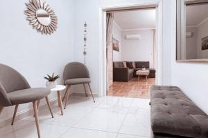 Area soggiorno di Penthouse - Amazing View in the Center of Athens