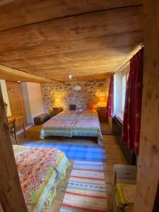 Postel nebo postele na pokoji v ubytování Casa Vegana