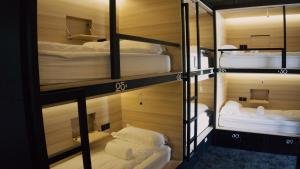 Giường trong phòng chung tại Nordic Hostel