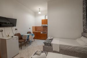 Postel nebo postele na pokoji v ubytování Hotel Vila Vilson
