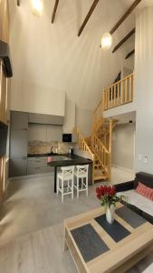 a living room with a couch and a table at Apartament Jasmin in Zator