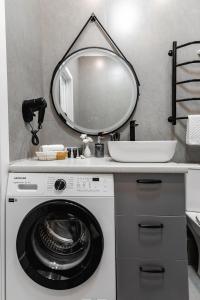 Φωτογραφία από το άλμπουμ του New luxury apartment R-House near MEGA στο Αλμάτι