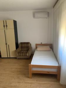 Postel nebo postele na pokoji v ubytování Kuca u Prokuplju