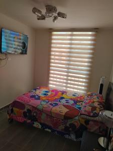 Ένα ή περισσότερα κρεβάτια σε δωμάτιο στο Apartamento amoblado